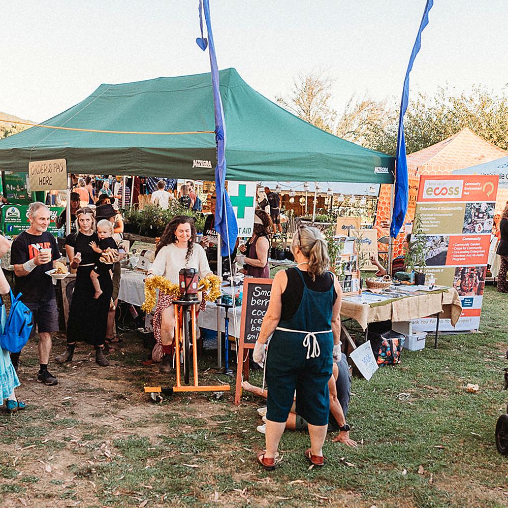 Stallholders and visitors at the Yarra Valley ECOSS community market in Wesburn, where Yarra Valley Massage & Sauna is based